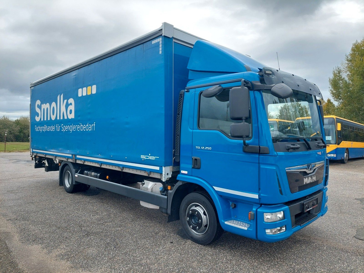 MAN TGL 12.250 BL 4x2 - Camion à rideaux coulissants: photos 2 MAN TGL 12.250 BL 4x2 - Camion à rideaux coulissants: photos 2