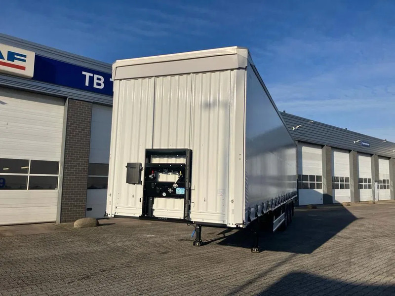 Kässbohrer SCS X / 90 - 12 /27 met hefdak en twee liftassen - Semi-remorque rideaux coulissants: photos 3 Kässbohrer SCS X / 90 - 12 /27 met hefdak en twee liftassen - Semi-remorque rideaux coulissants: photos 3