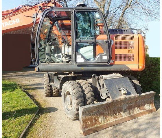 Hitachi Zaxis 140W-5B - Pelle sur pneus: photos 2 Hitachi Zaxis 140W-5B - Pelle sur pneus: photos 2