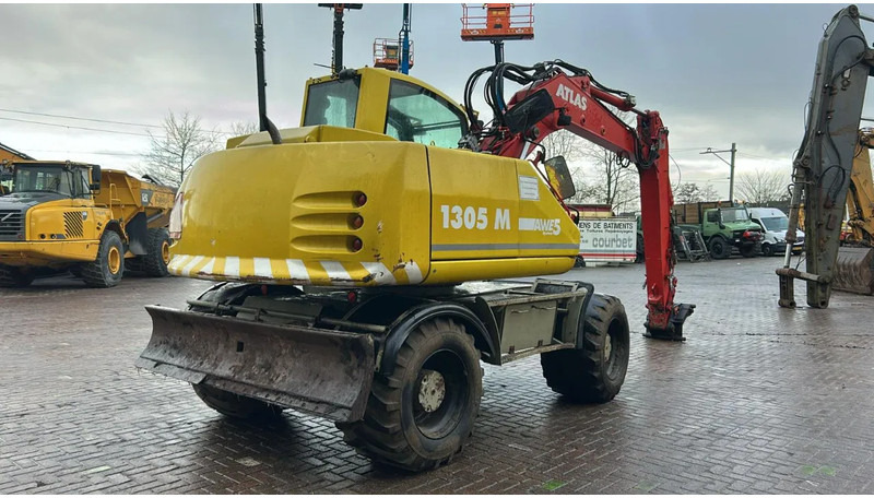 Atlas 1305 - Pelle sur pneus: photos 3 Atlas 1305 - Pelle sur pneus: photos 3