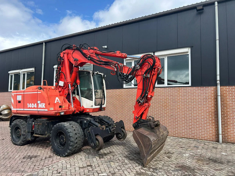 Atlas 1404 - Pelle sur pneus: photos 2 Atlas 1404 - Pelle sur pneus: photos 2