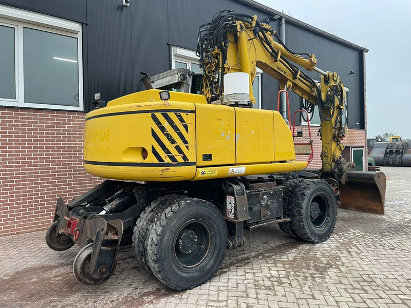 Atlas 1604K - Pelle sur pneus: photos 3 Atlas 1604K - Pelle sur pneus: photos 3