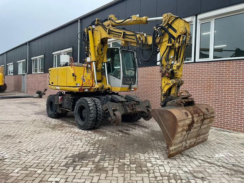 Atlas 1604K - Pelle sur pneus: photos 2 Atlas 1604K - Pelle sur pneus: photos 2