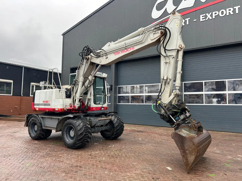 Takeuchi TB1160W - Pelle sur pneus: photos 2 Takeuchi TB1160W - Pelle sur pneus: photos 2