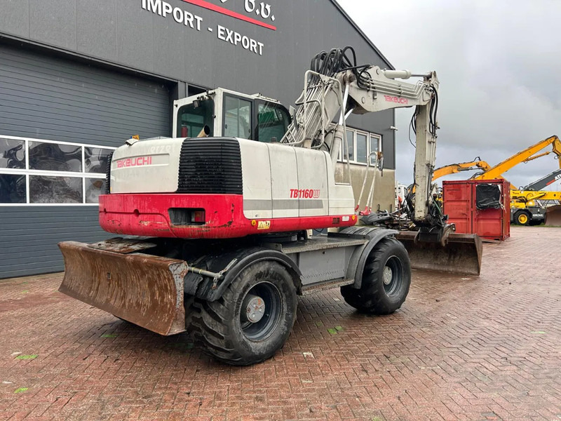 Takeuchi TB1160W - Pelle sur pneus: photos 3 Takeuchi TB1160W - Pelle sur pneus: photos 3