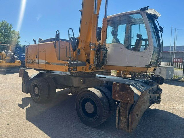 Liebherr A 904 C Litronic + Grab - Pelle de manutention: photos 5 Liebherr A 904 C Litronic + Grab - Pelle de manutention: photos 5