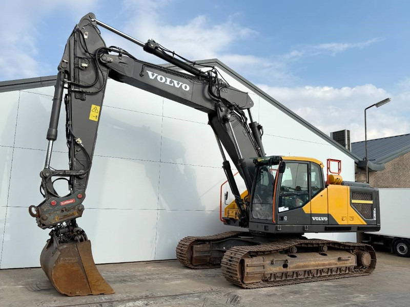 Volvo EC300ENL - Oilquick / Triple Boom / Tilting Bucket - Pelle sur chenille: photos 2 Volvo EC300ENL - Oilquick / Triple Boom / Tilting Bucket - Pelle sur chenille: photos 2