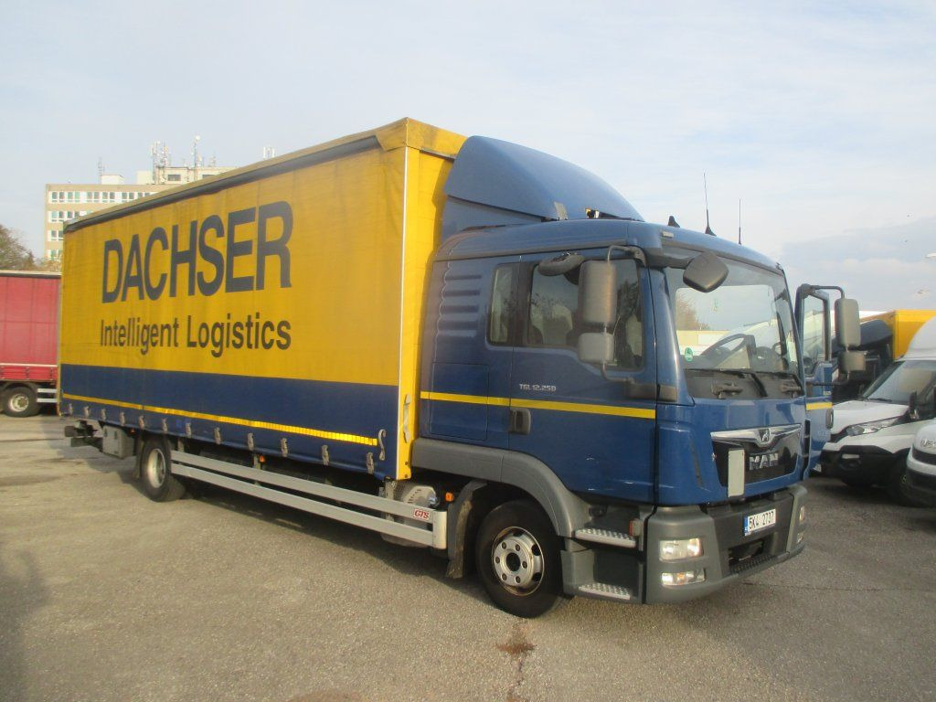 MAN TGL 12.250 - Camion à rideaux coulissants: photos 3 MAN TGL 12.250 - Camion à rideaux coulissants: photos 3