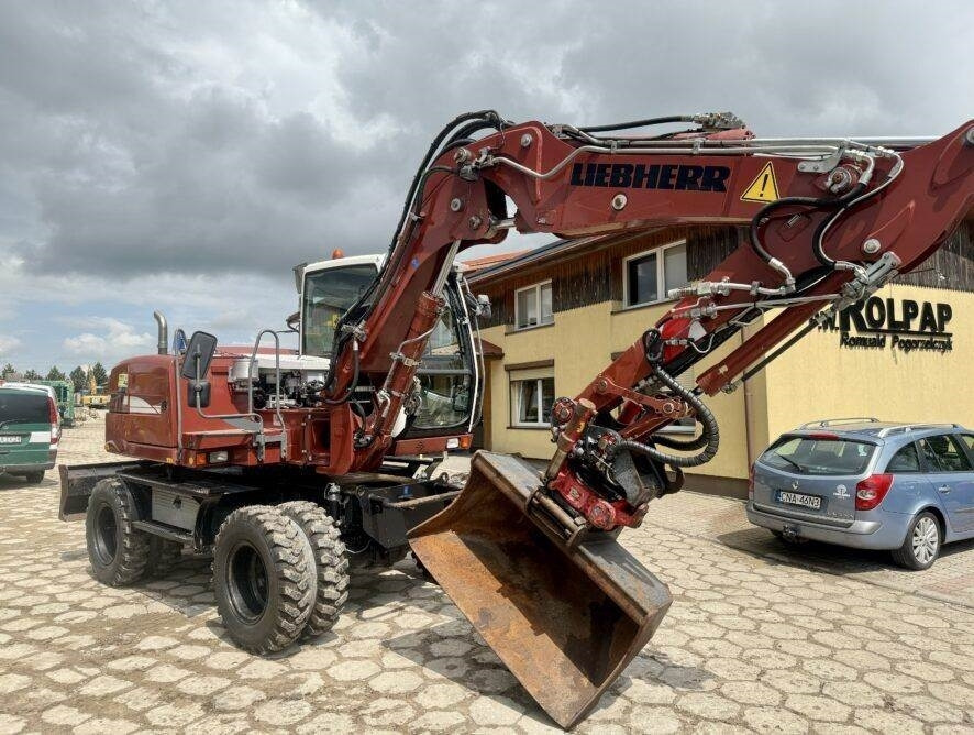 Liebherr A311 Litronic - Pelle sur pneus: photos 3 Liebherr A311 Litronic - Pelle sur pneus: photos 3