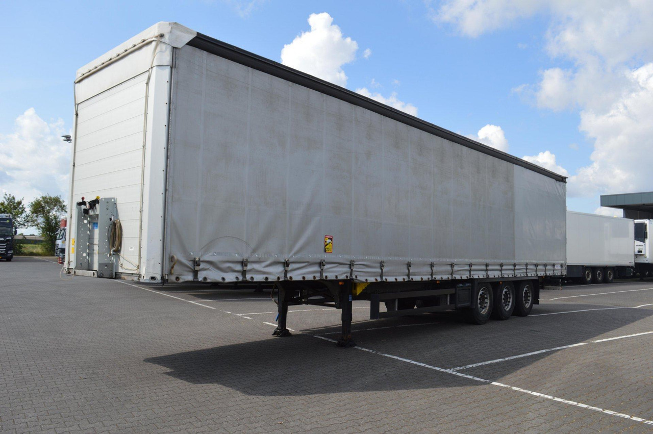 Schmitz Cargobull SCS24/L - Semi-remorque rideaux coulissants: photos 1 Schmitz Cargobull SCS24/L - Semi-remorque rideaux coulissants: photos 1