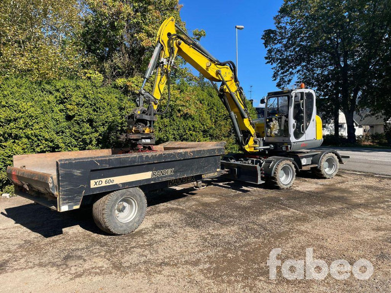 WACKER NEUSON EW100 - Pelle sur pneus: photos 1 WACKER NEUSON EW100 - Pelle sur pneus: photos 1