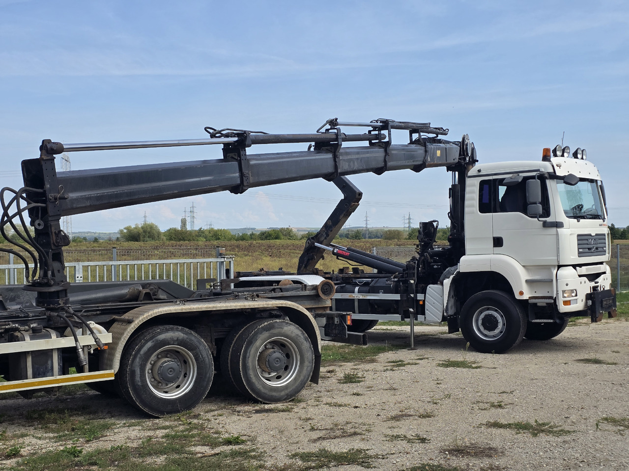 MAN TGA 26.440 6X6 / HOOK SYSTEM / HIAB 166D REMOTE SPECIAL PRICE ONLY THIS YEAR - Camion ampliroll, Camion grue: photos 4 MAN TGA 26.440 6X6 / HOOK SYSTEM / HIAB 166D REMOTE SPECIAL PRICE ONLY THIS YEAR - Camion ampliroll, Camion grue: photos 4