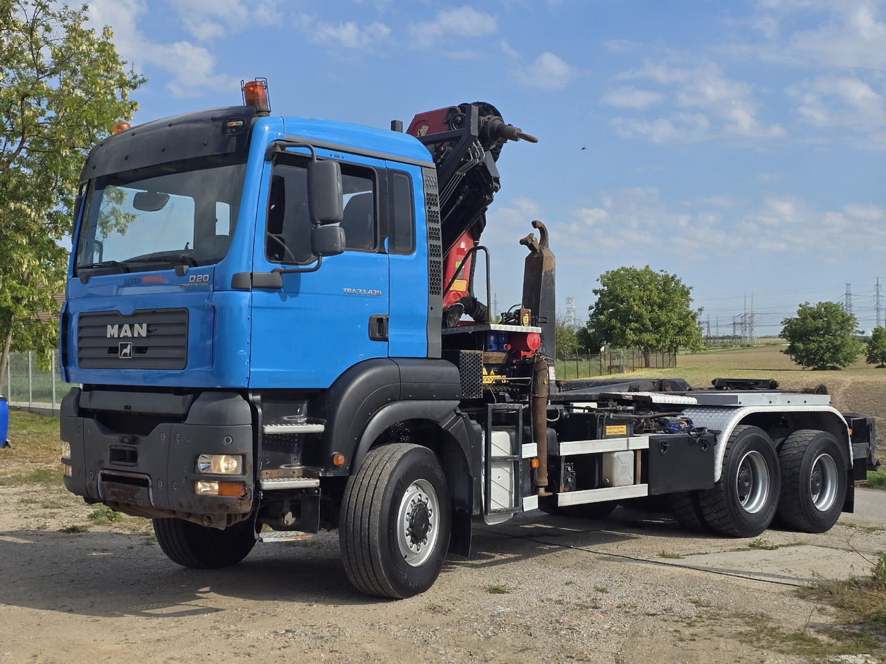 MAN TGA 33.430 6X6 / HMF 1823 K3+REM.CON./ HOOK SYSTEM 2x in stock - Camion ampliroll, Camion grue: photos 3 MAN TGA 33.430 6X6 / HMF 1823 K3+REM.CON./ HOOK SYSTEM 2x in stock - Camion ampliroll, Camion grue: photos 3