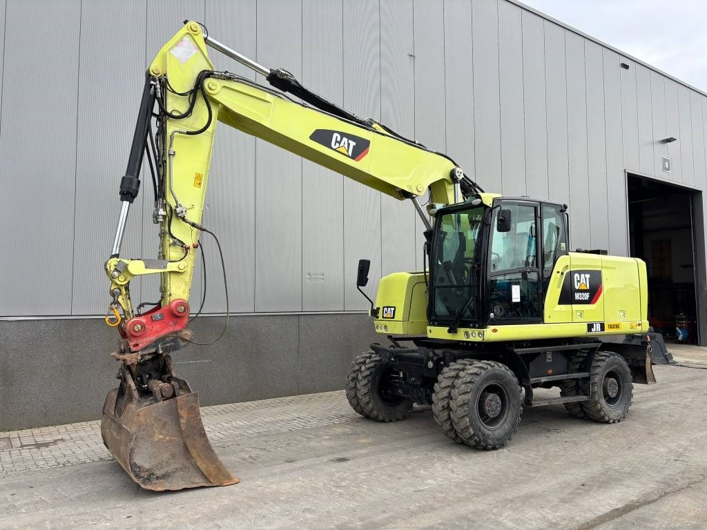 CAT M 320 F - Pelle sur pneus: photos 2 CAT M 320 F - Pelle sur pneus: photos 2