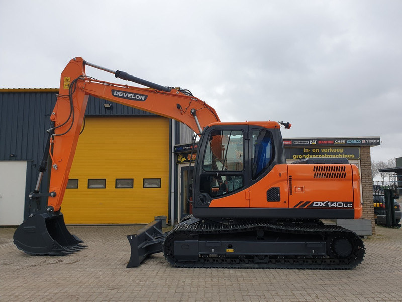 Develon DX140LC - Pelle sur chenille: photos 1 Develon DX140LC - Pelle sur chenille: photos 1