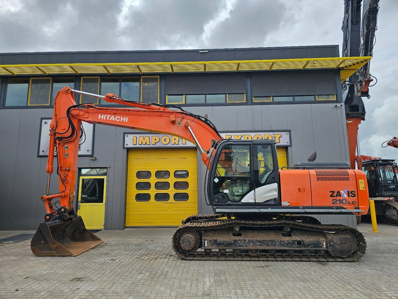 Hitachi ZX210LC-5B - Pelle sur chenille: photos 1 Hitachi ZX210LC-5B - Pelle sur chenille: photos 1