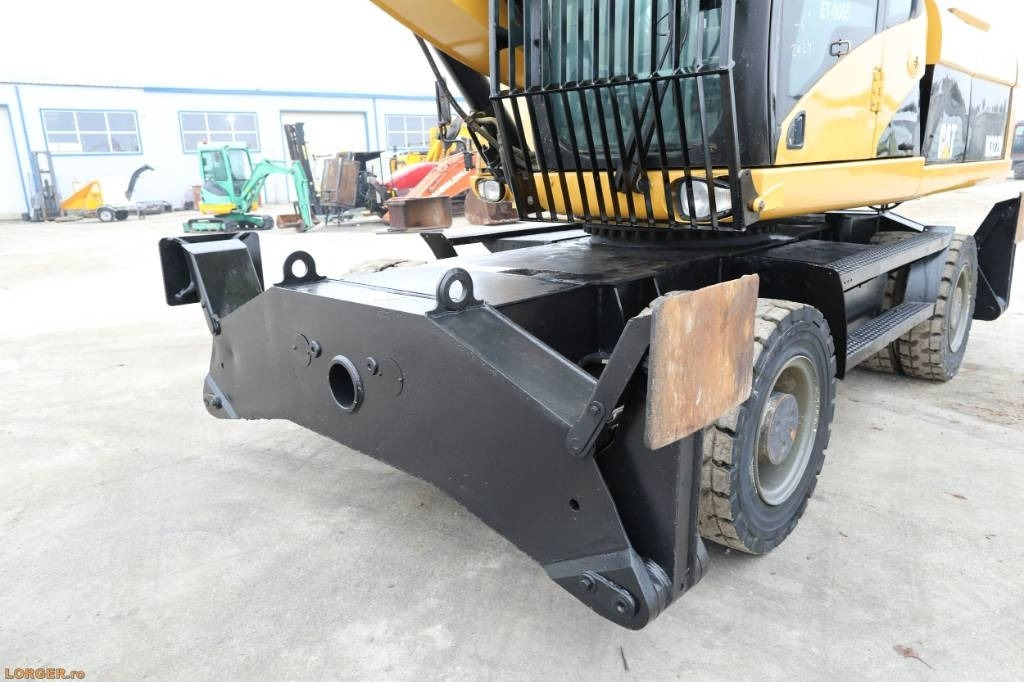 Pelle de manutention CAT M 322 D: photos 17