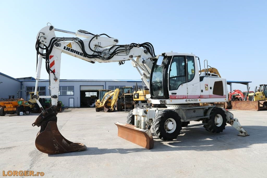 Liebherr A 914 - Pelle sur pneus: photos 4 Liebherr A 914 - Pelle sur pneus: photos 4