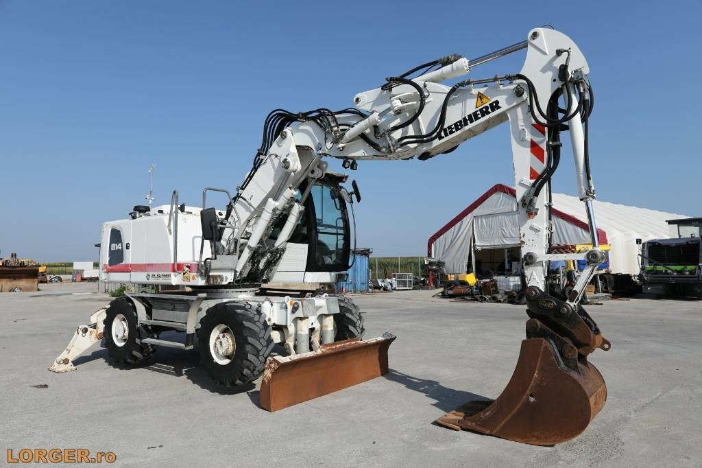 Liebherr A 914 - Pelle sur pneus: photos 1 Liebherr A 914 - Pelle sur pneus: photos 1