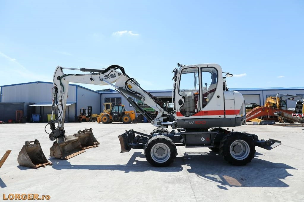 Wacker Neuson EW 100 - Pelle sur pneus: photos 1 Wacker Neuson EW 100 - Pelle sur pneus: photos 1