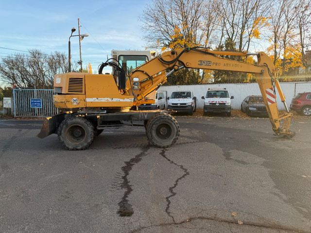 Liebherr 312 - Pelle sur pneus: photos 3 Liebherr 312 - Pelle sur pneus: photos 3