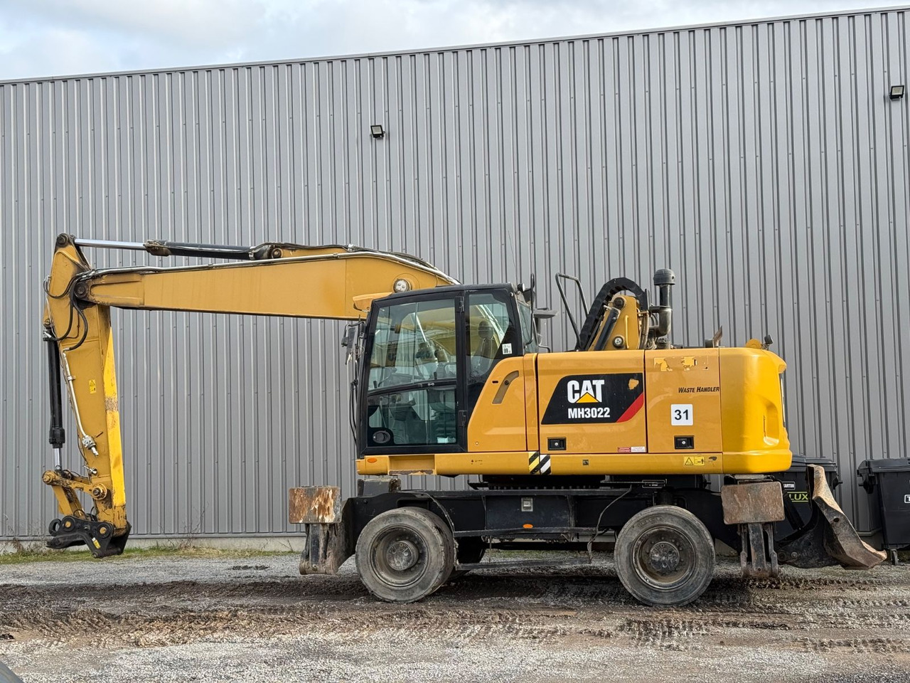 CAT MH3022 - Pelle sur pneus: photos 5 CAT MH3022 - Pelle sur pneus: photos 5