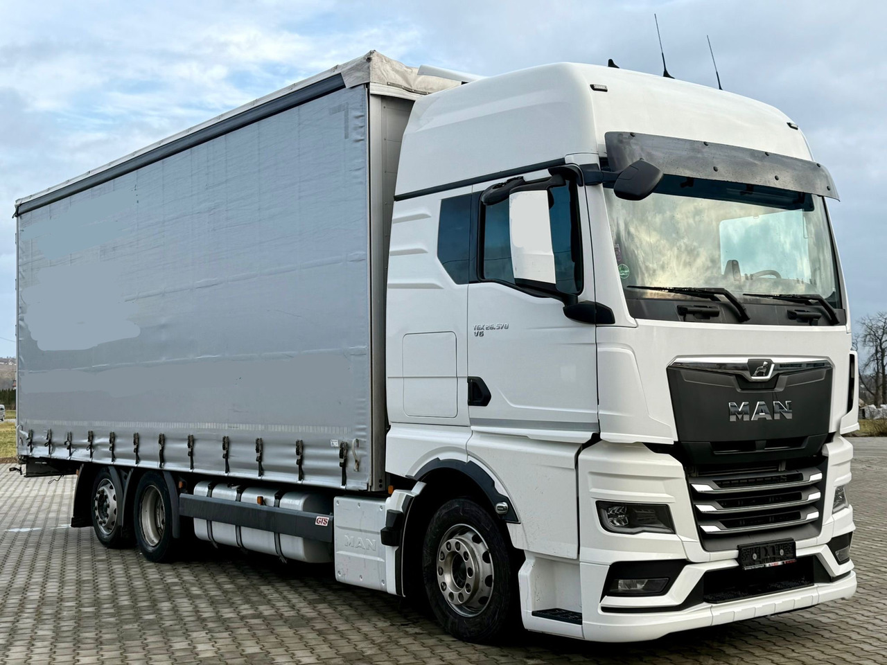 MAN TGX 26.470 / FIRANKA / 19 EUROPALET / XXL / NISKI PRZEBIEG / NOWY MODEL / 6X2 - Camion à rideaux coulissants: photos 1 MAN TGX 26.470 / FIRANKA / 19 EUROPALET / XXL / NISKI PRZEBIEG / NOWY MODEL / 6X2 - Camion à rideaux coulissants: photos 1