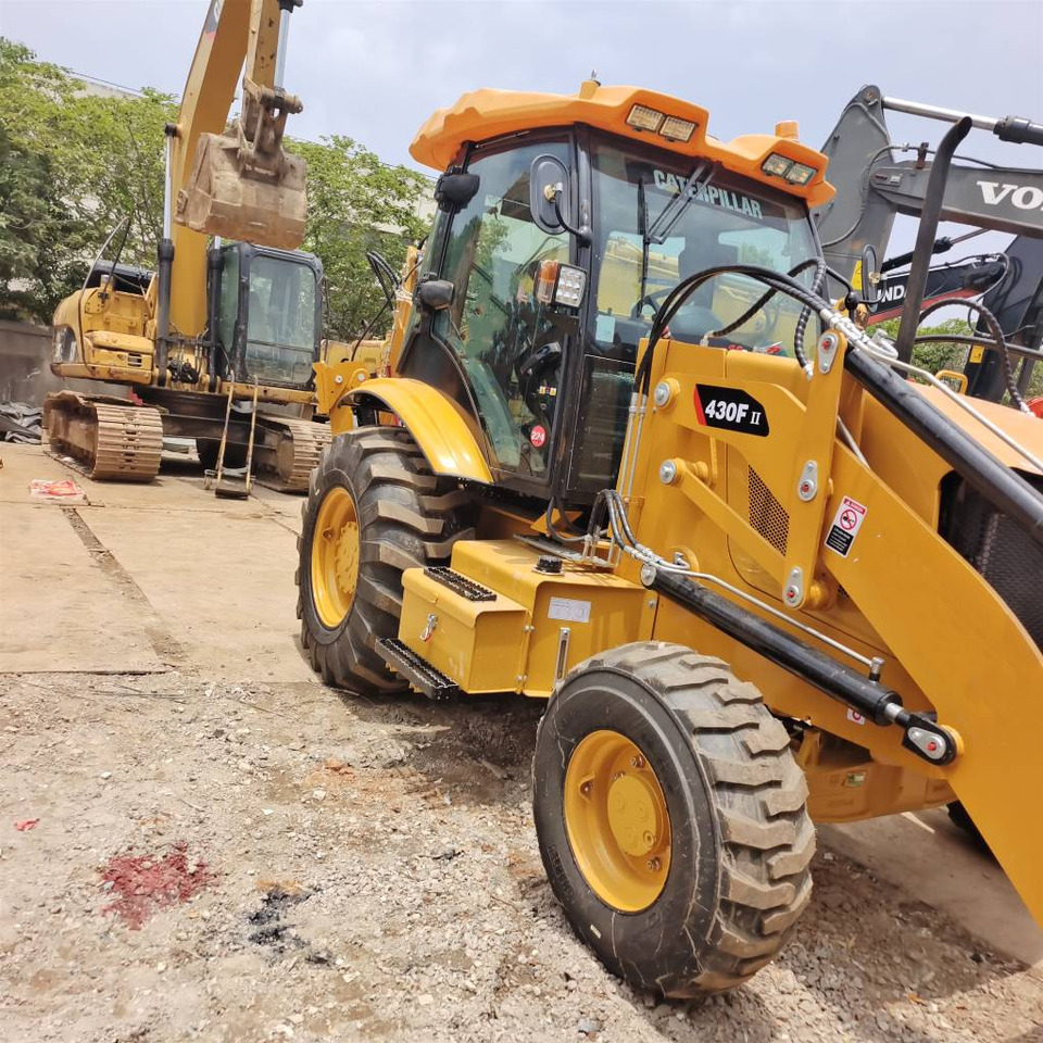 Tractopelle CAT 430 F 100% New