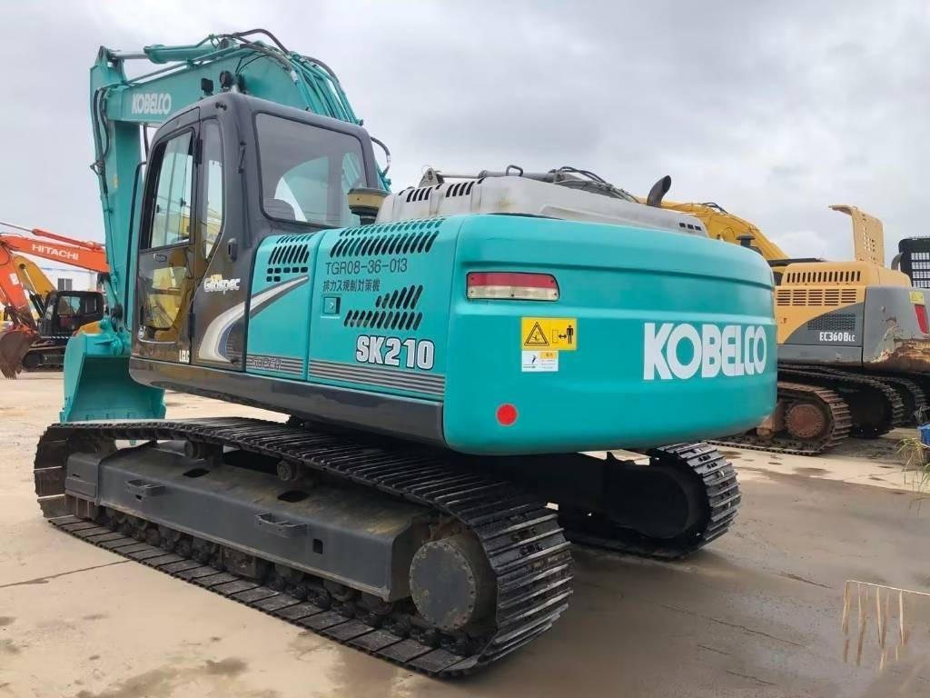Kobelco SK 210 - Pelle sur chenille: photos 1 Kobelco SK 210 - Pelle sur chenille: photos 1