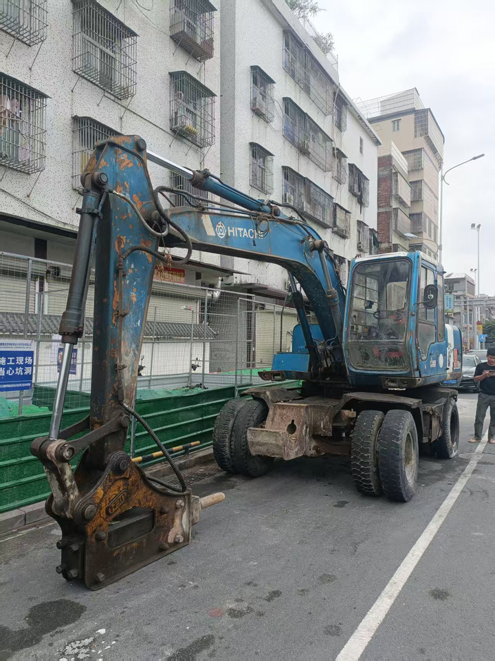 HITACHI EX100WD-2 - Pelle sur pneus: photos 1 HITACHI EX100WD-2 - Pelle sur pneus: photos 1