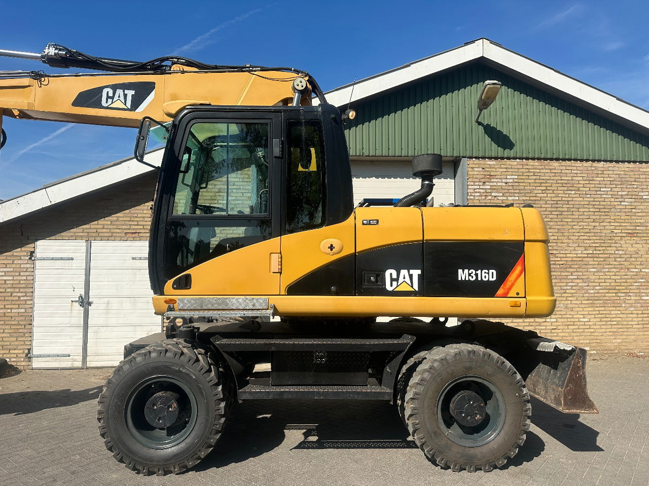 Caterpillar M316D - Chargeuse sur pneus: photos 4 Caterpillar M316D - Chargeuse sur pneus: photos 4