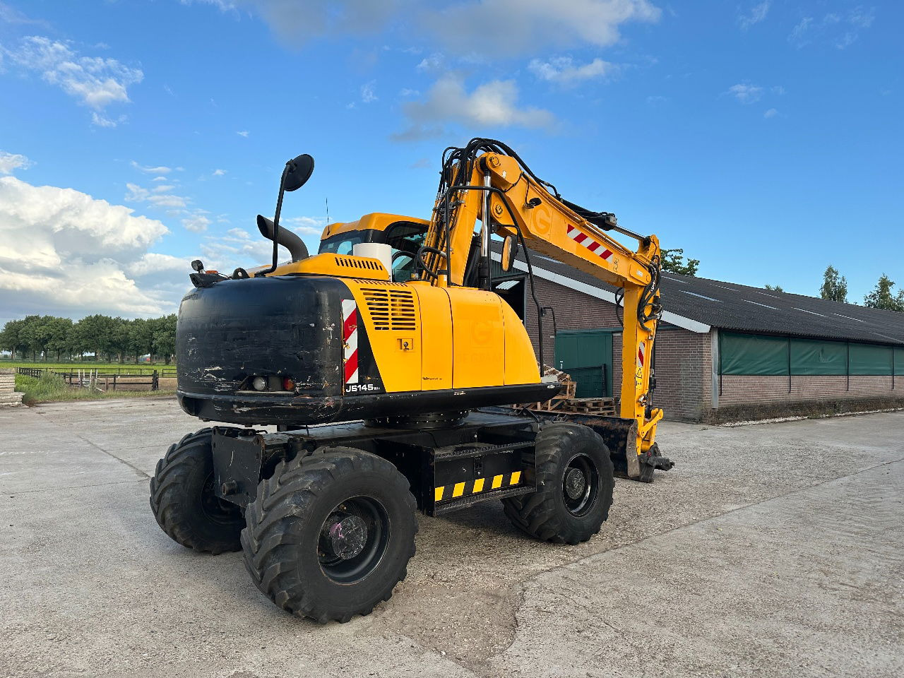 JCB JS145W - Pelle sur pneus: photos 5 JCB JS145W - Pelle sur pneus: photos 5