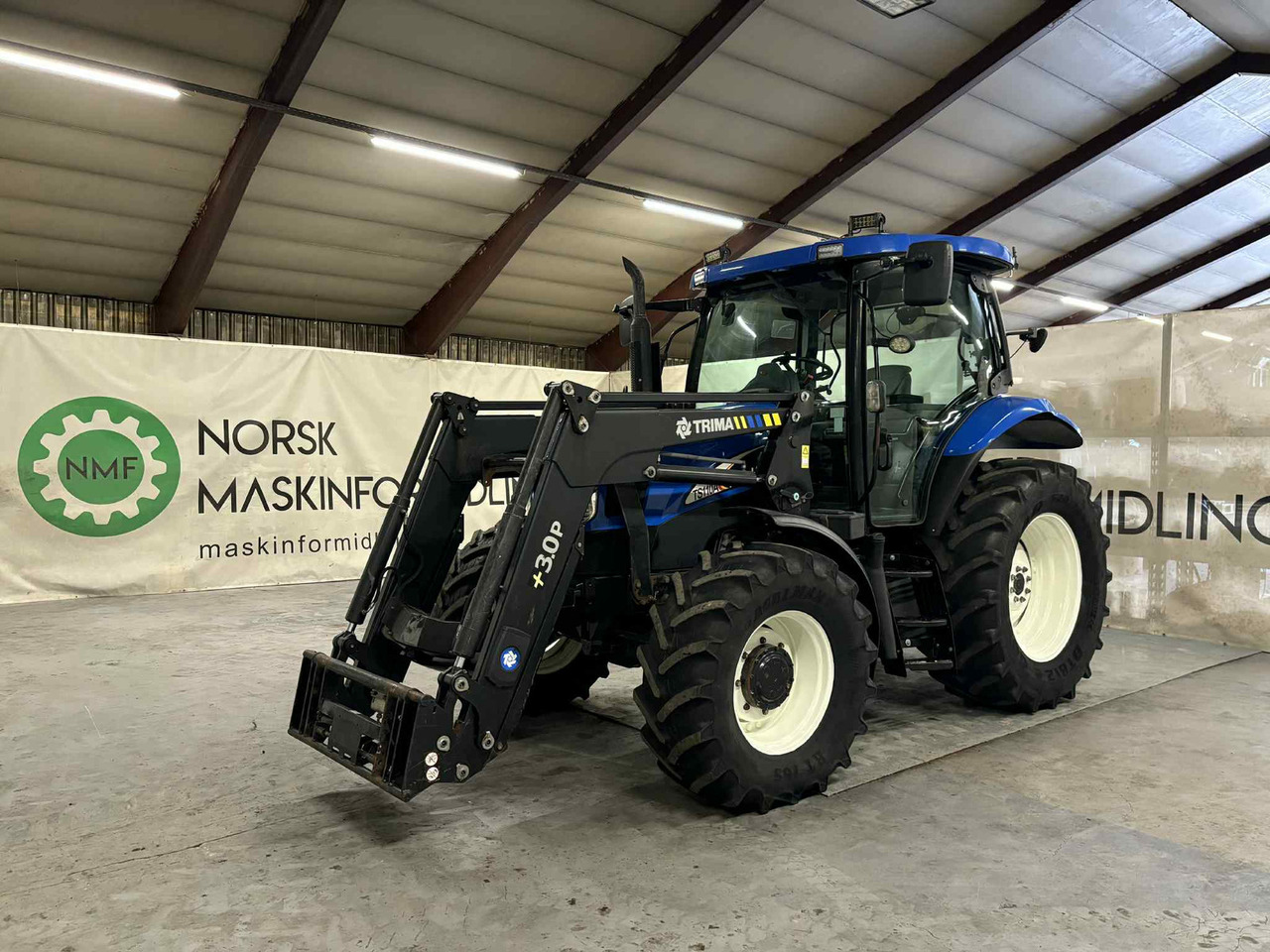 New Holland TS110A - Tracteur agricole: photos 1 New Holland TS110A - Tracteur agricole: photos 1