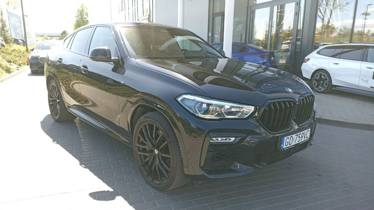 BMW X6 M50i SUV - SUV: photos 1 BMW X6 M50i SUV - SUV: photos 1