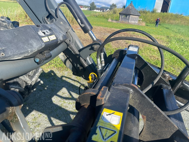 2009 New Holland T6070 - med frontlaster - Tracteur agricole: photos 5 2009 New Holland T6070 - med frontlaster - Tracteur agricole: photos 5