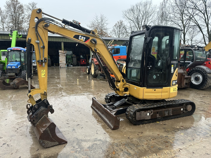 Caterpillar 303.5E CR All functions 3 buckets - Mini pelle: photos 1 Caterpillar 303.5E CR All functions 3 buckets - Mini pelle: photos 1