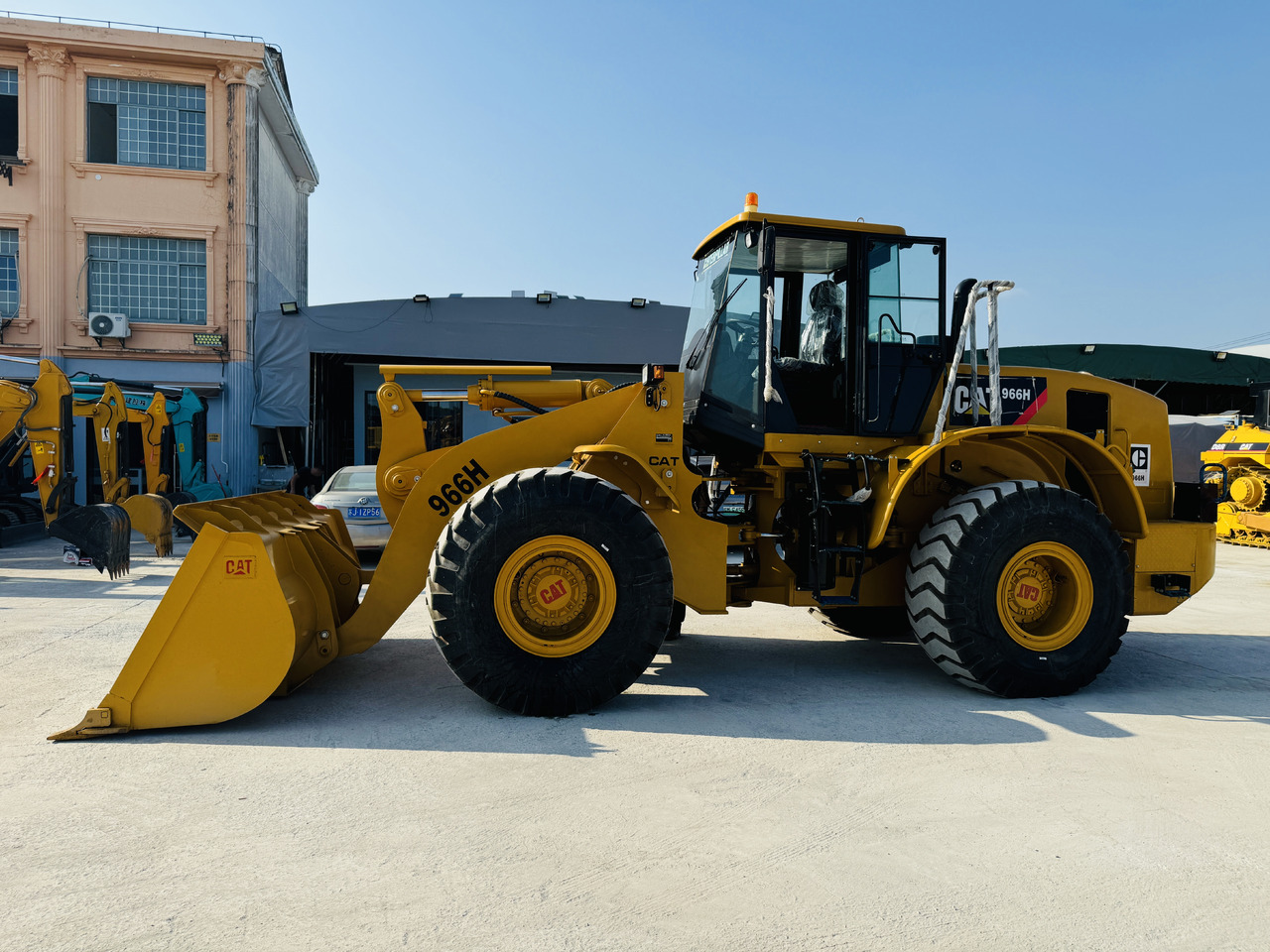 Chargeuse sur pneus Caterpillar Used Loader CAT966 966H 966G 966F 980G 988G Secondhand Loaders in High Quality: photos 7