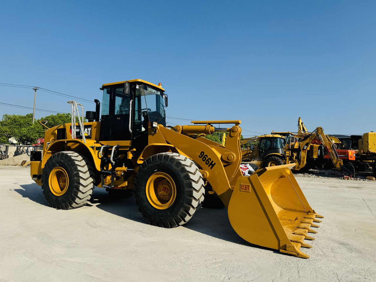 Chargeuse sur pneus Caterpillar Used Loader CAT966 966H 966G 966F 980G 988G Secondhand Loaders in High Quality: photos 6