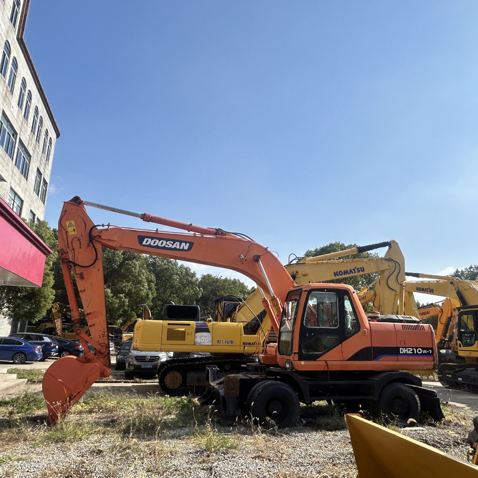 Doosan DH210w-7 wheel excavator - Pelle sur pneus: photos 1 Doosan DH210w-7 wheel excavator - Pelle sur pneus: photos 1