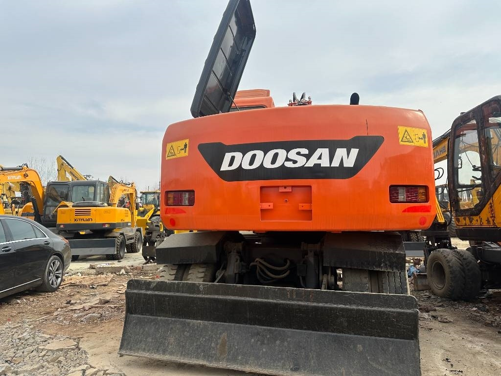 Doosan DX 150W -9 - Pelle sur pneus: photos 2 Doosan DX 150W -9 - Pelle sur pneus: photos 2