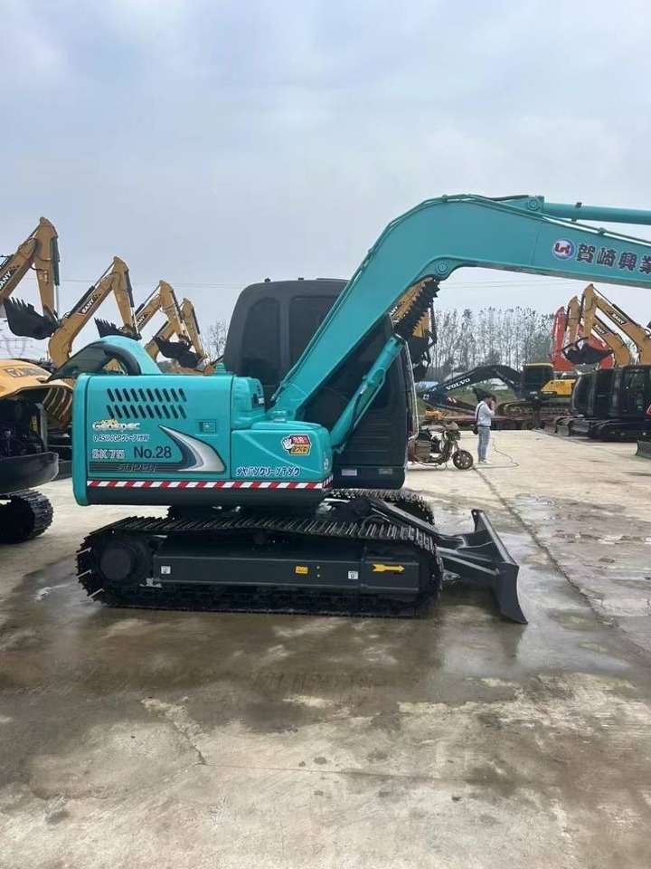 Kobelco SK 75 - Pelle sur chenille: photos 1 Kobelco SK 75 - Pelle sur chenille: photos 1