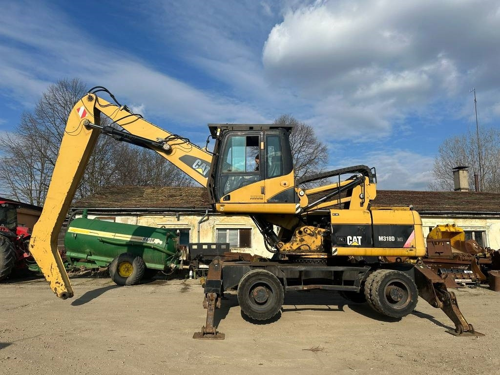 CAT M 318 D MH - Pelle de manutention: photos 2 CAT M 318 D MH - Pelle de manutention: photos 2
