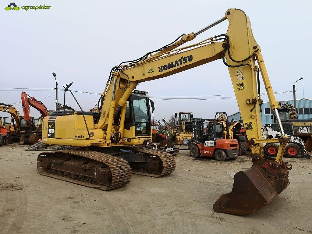 Komatsu PC180LC-7K - Pelle sur chenille: photos 1 Komatsu PC180LC-7K - Pelle sur chenille: photos 1