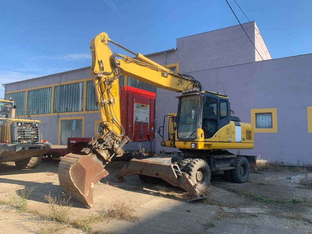 Komatsu PW180-E0+Engcon Rototilt - Pelle sur pneus: photos 1 Komatsu PW180-E0+Engcon Rototilt - Pelle sur pneus: photos 1