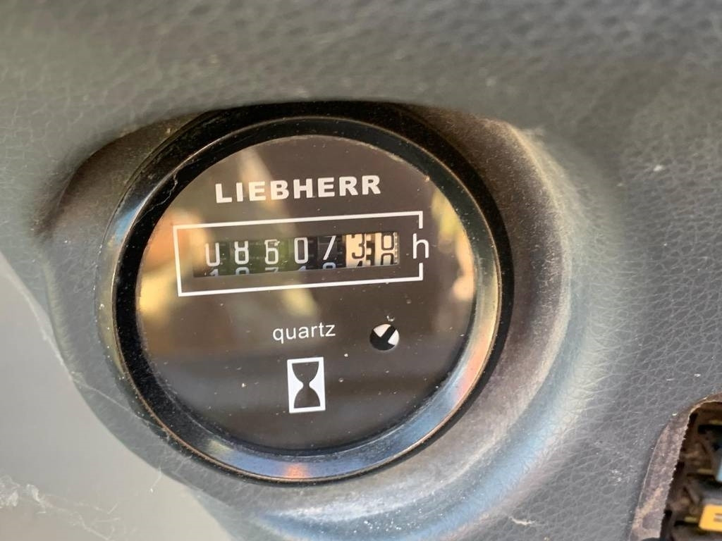 Pelle sur pneus Liebherr A 312: photos 10