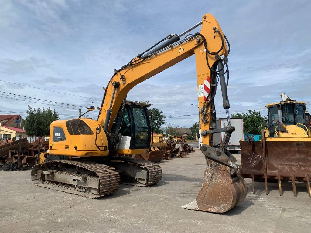 Liebherr R 914 Compact Litronic - Pelle sur pneus: photos 2 Liebherr R 914 Compact Litronic - Pelle sur pneus: photos 2