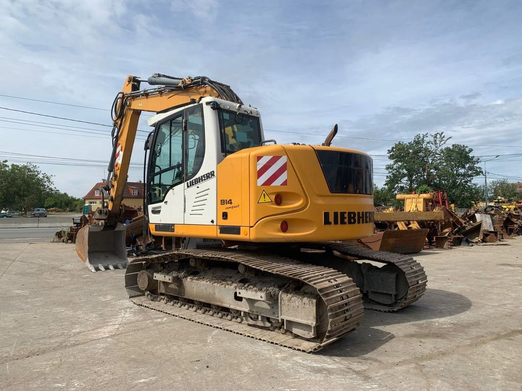 Pelle sur pneus Liebherr R 914 Compact Litronic: photos 6