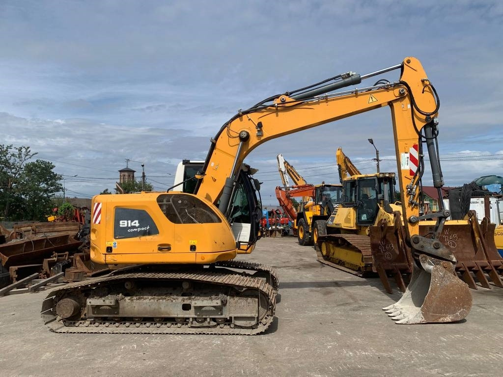 Liebherr R 914 Compact Litronic - Pelle sur pneus: photos 3 Liebherr R 914 Compact Litronic - Pelle sur pneus: photos 3