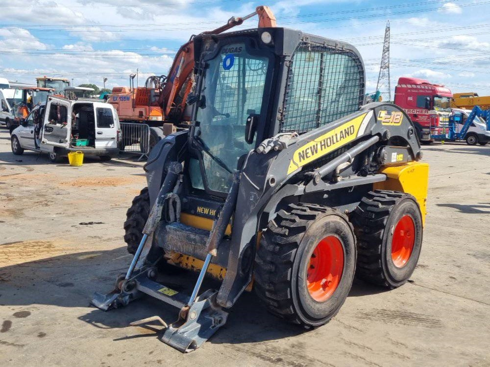New Holland L 218 - Mini chargeuse: photos 1 New Holland L 218 - Mini chargeuse: photos 1