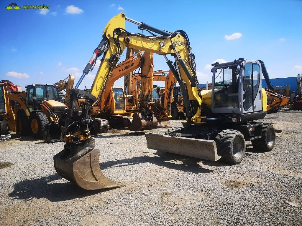 Wacker Neuson EW 100 - Pelle sur pneus: photos 1 Wacker Neuson EW 100 - Pelle sur pneus: photos 1